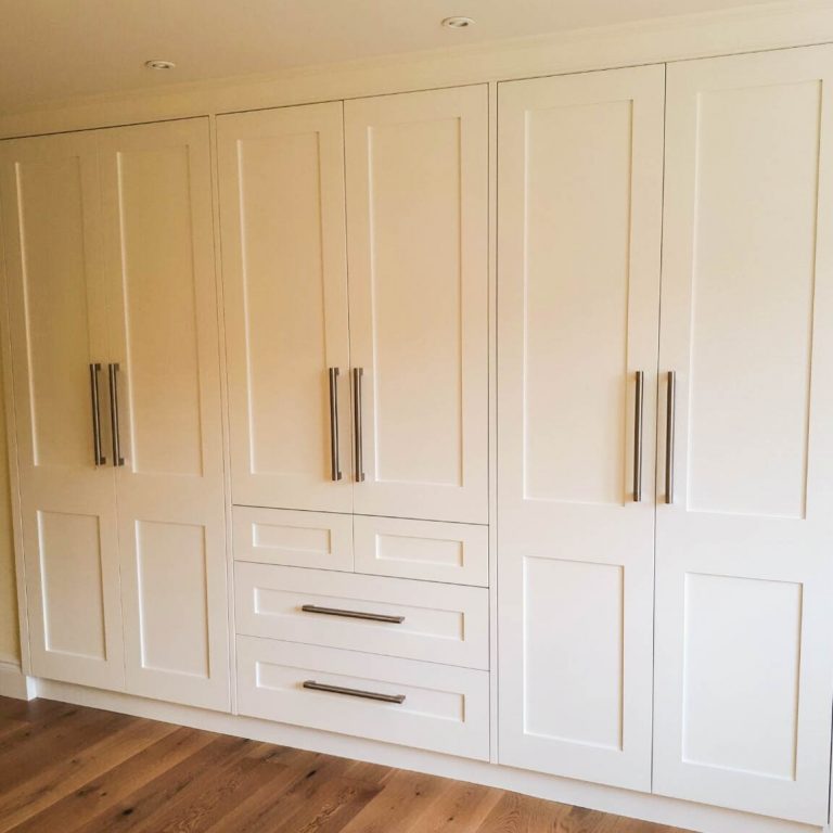 Cream wardrobes with drawers
